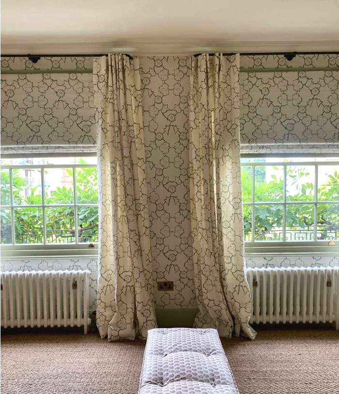 Lucy Lane Fox matched curtains and blinds with wallpaper.